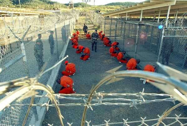 20 Years Later, the Story Behind the Guantánamo Photo That Won’t Go Away | INFBusiness.com