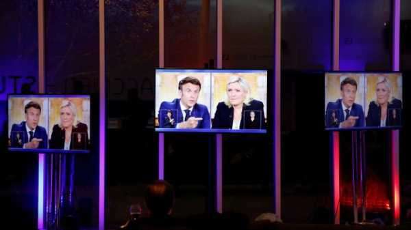 Macron, Le Pen spar over disability allowance in TV debate | INFBusiness.com