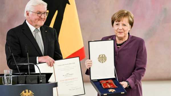 Merkel receives highest German award amid criticism | INFBusiness.com