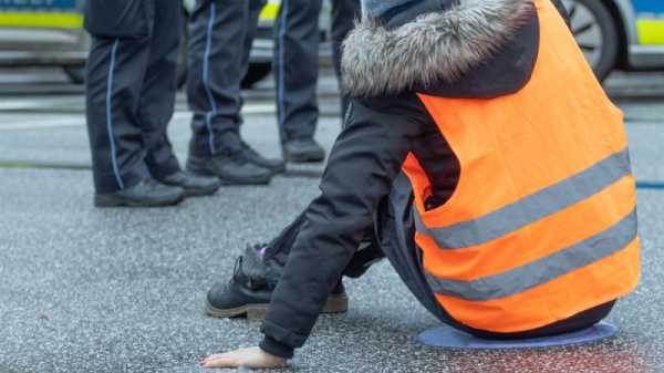 Austria’s ‘sticky’ climate activists draw ire of leaders as 57 arrested | INFBusiness.com