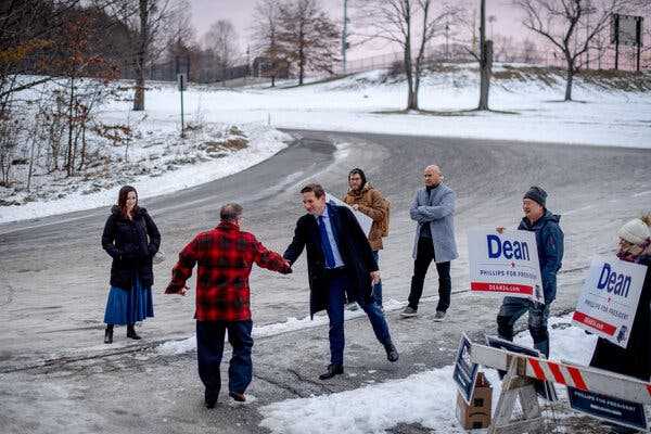 Dean Phillips Greets Voters as ‘Write-In Biden’ Supporters Glare | INFBusiness.com