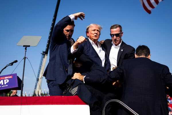 Trump Injured in Assassination Attempt at Campaign Rally | INFBusiness.com