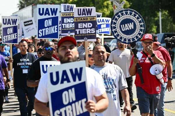 UAW Files Labor Charges Against Trump and Musk Over Interview on X | INFBusiness.com