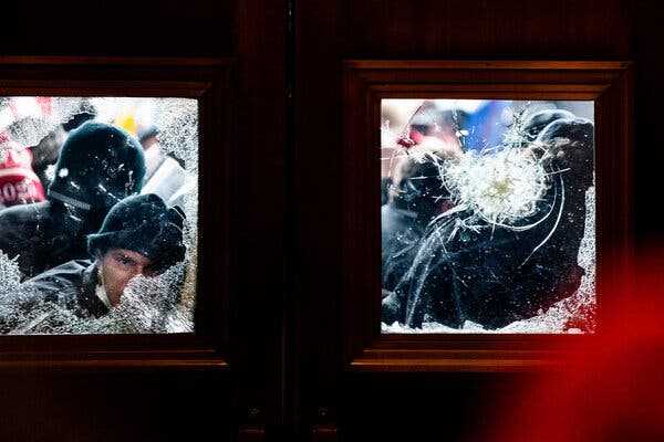 Justice Dept. Charges Two Men in Jan. 6 Assault on Times Photographer | INFBusiness.com