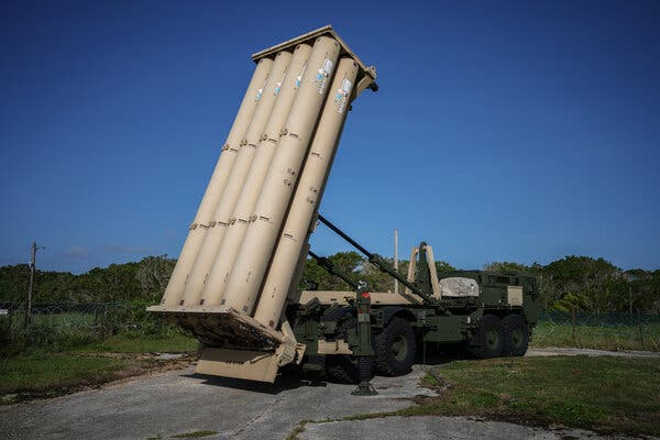 A large defense system points up toward the sky.