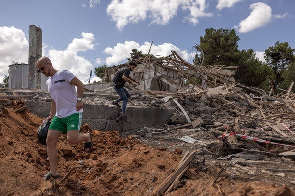 People atop debris.