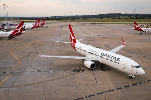 Qantas airplanes on a tarmac.