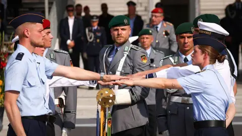 Christian Mang/Getty ImagesThe government aims to expand military personnel by 80,000 by the early 2030s German cabinet backs voluntary military service, opening door to conscription | INFBusiness.com