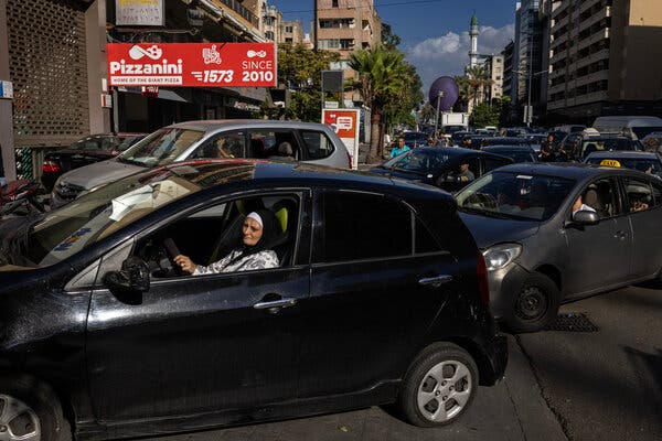 Lines of vehicles on a Beirut street.